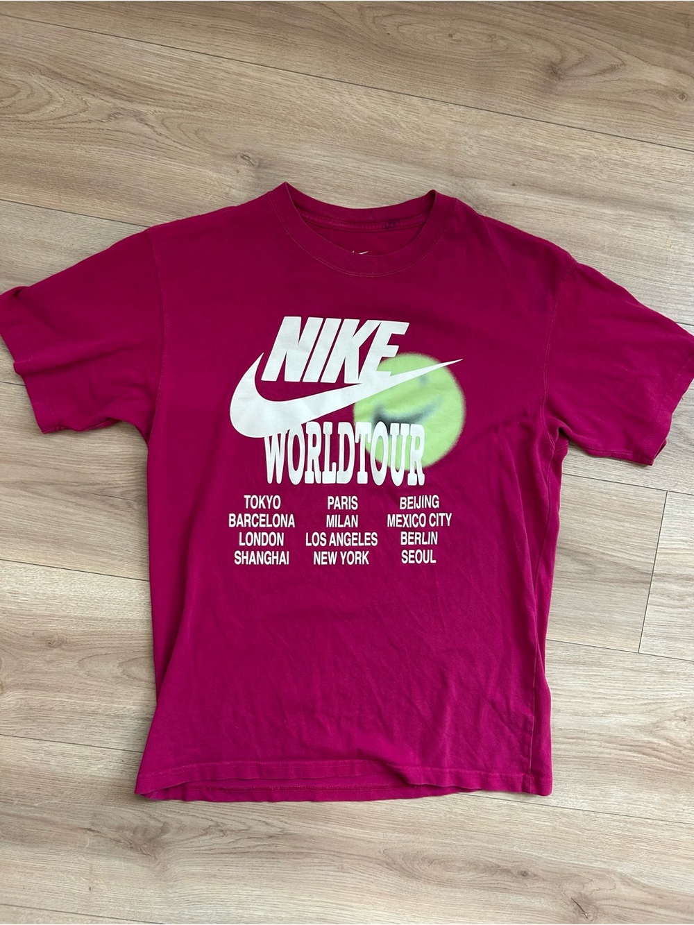 Nike Bright Magenta Short-Sleeve World Tour Graphic Tee